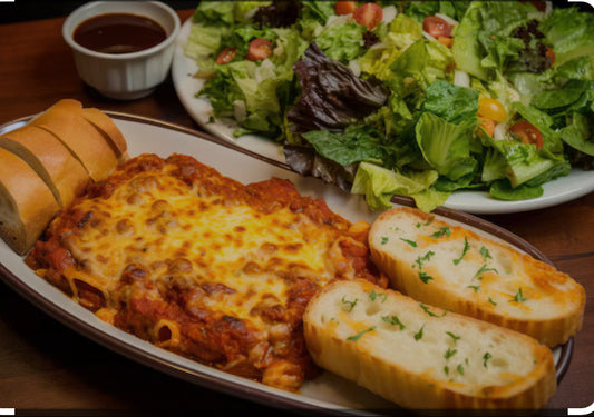 Lasagna with Corn, Side Salad, and Garlic Bread